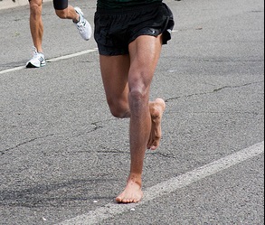 Running barefoot on road sale