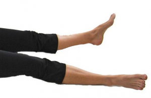 The feet and legs in savasana