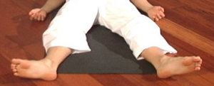 The feet and legs in savasana